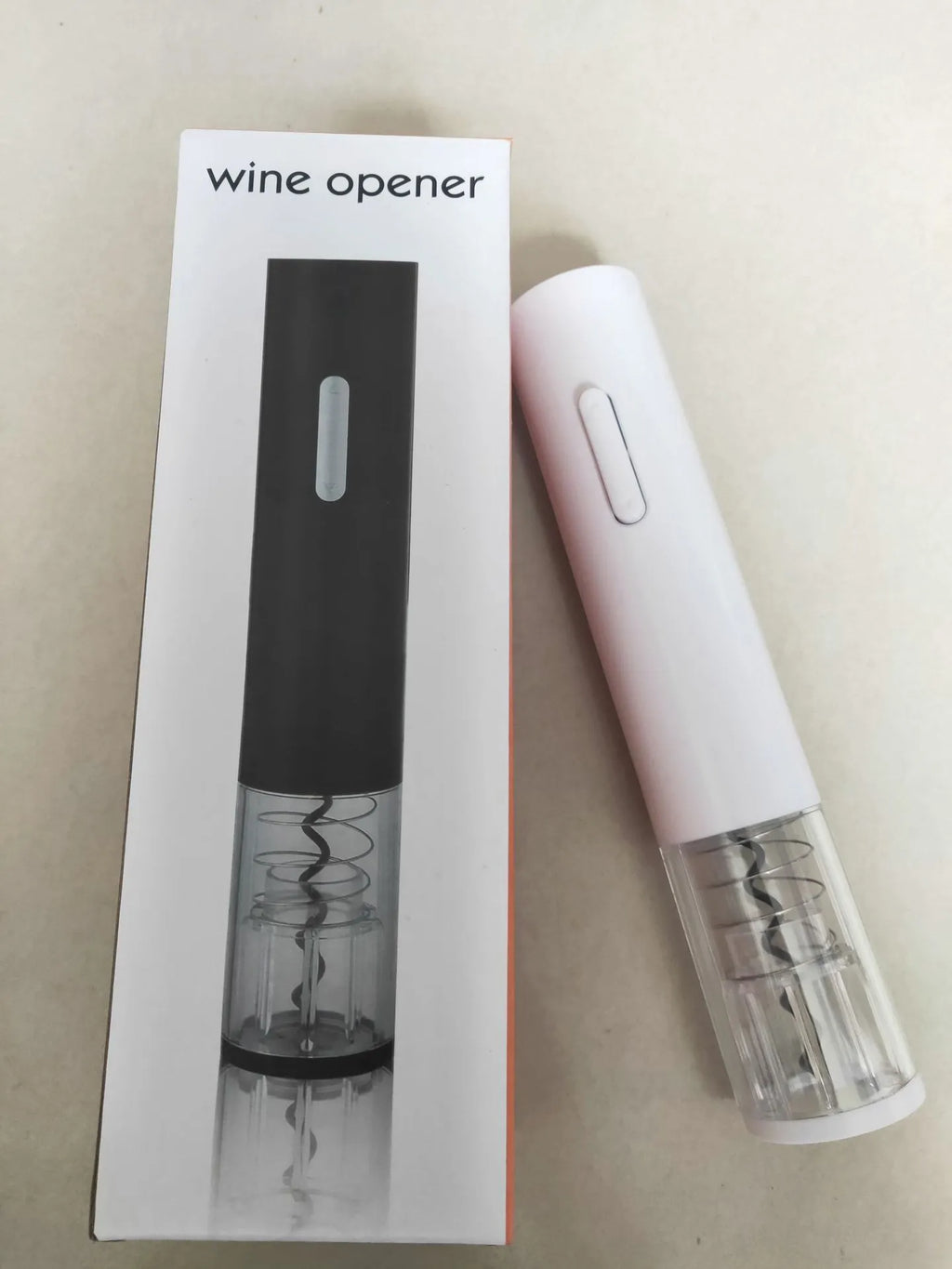 Automatic electric wine bottle opener with foil cutter in black, red, or white plastic finish.