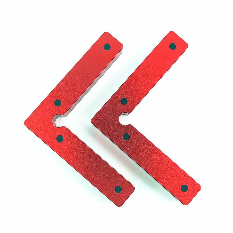 Machined aluminium right angle positioning block with measurement scales for woodworking jigs.
