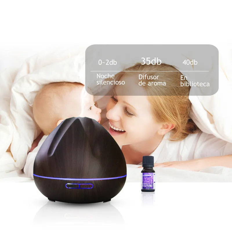 Air humidifier aromatherapy machine with 500ml capacity and light wood finish placed on a desk