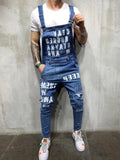 Men's black braces ripped jeans jumpsuit with adjustable shoulder straps on a model