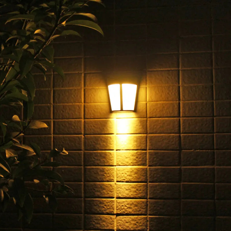 Solar wall lamp with 6 LED lights in IP65 waterproof housing for outdoor garden and courtyard illumination