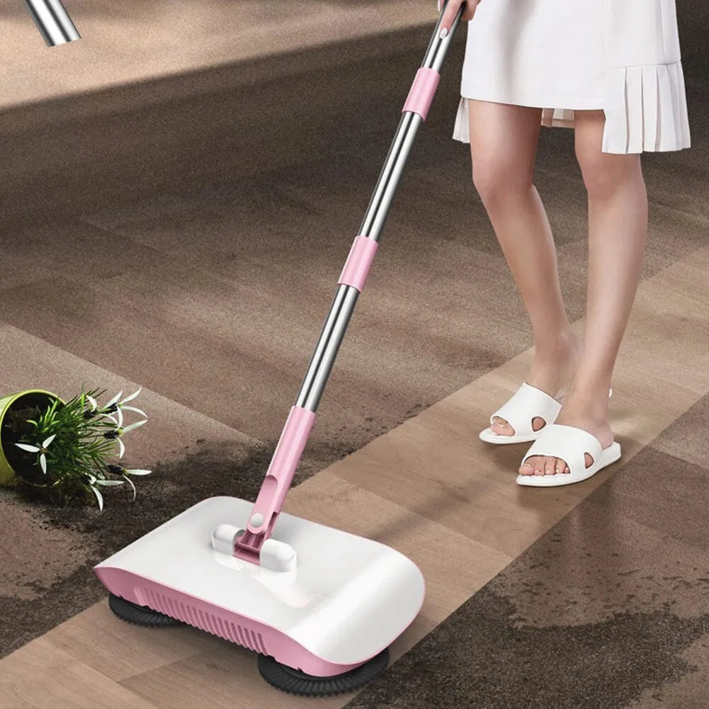 Pink hand push sweeper all-in-one broom dustpan mop with 360-degree brush on tile floor