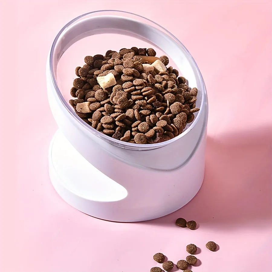 White elevated clear plastic cat food bowl with a tilted feeding surface for neck support.