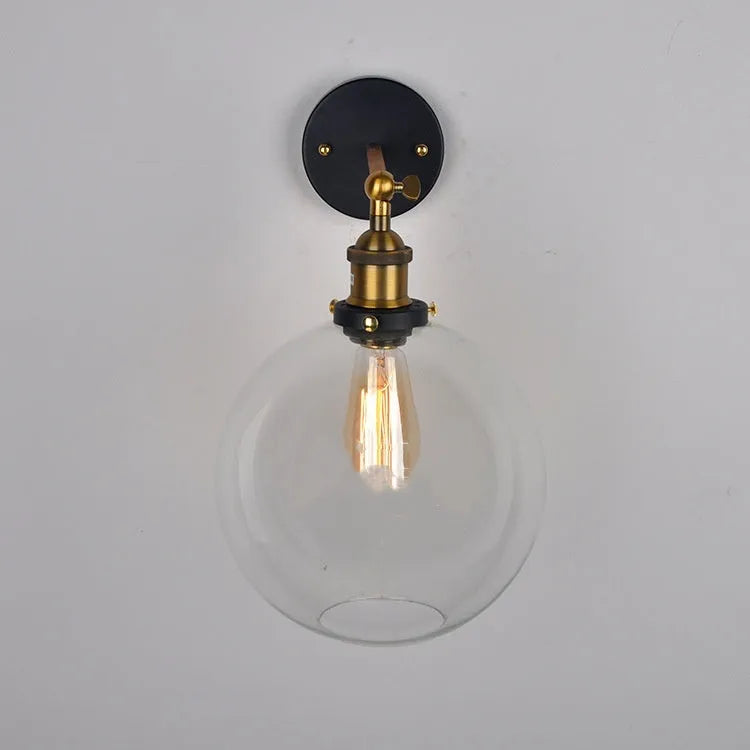 20cm diameter retro spherical glass wall lamp in amber, smoky grey, or transparent with aluminium holder.