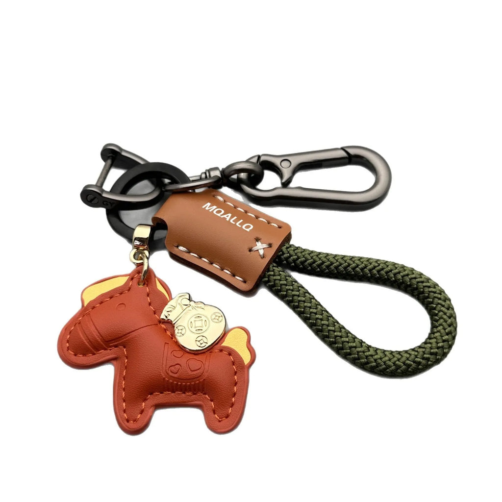 Handmade cowhide car key ring pendant with zinc alloy pony belt buckle on a colourful flanelle rope.
