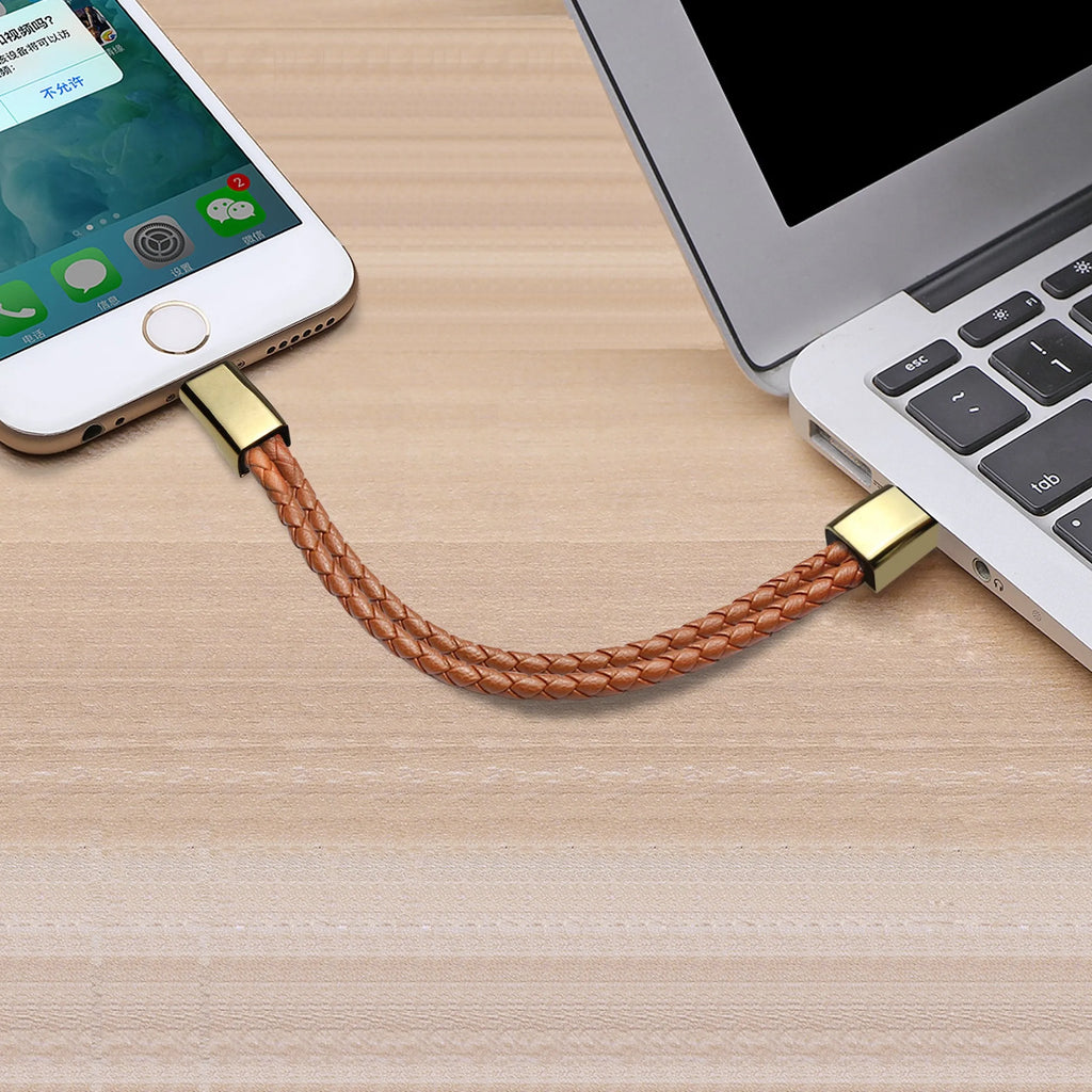 Brown double line bracelet-style charging cable with Mini USB to Micro USB connector.
