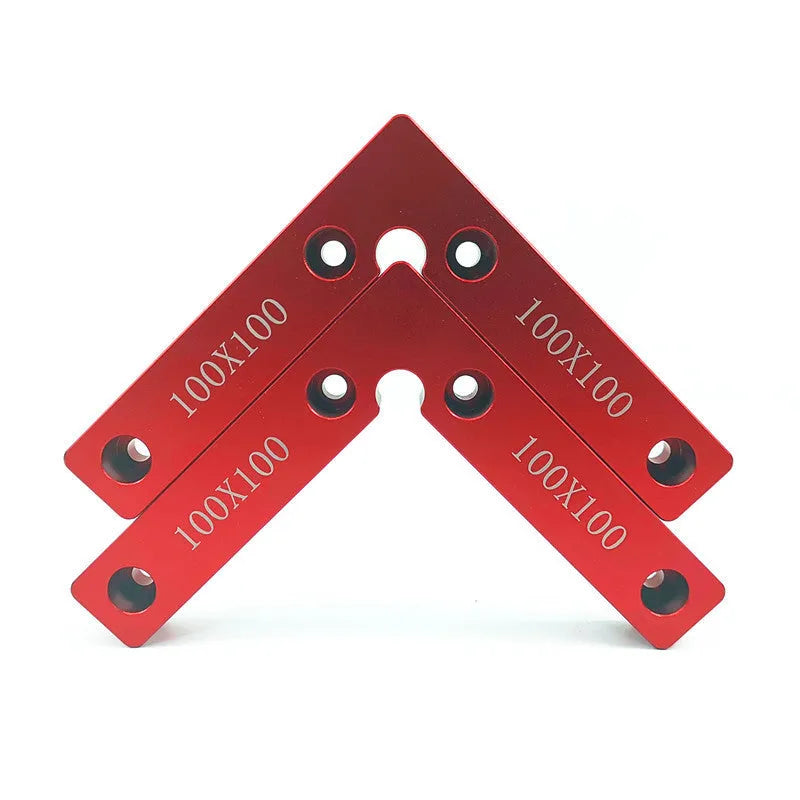 Machined aluminium right angle positioning block with measurement scales for woodworking jigs.