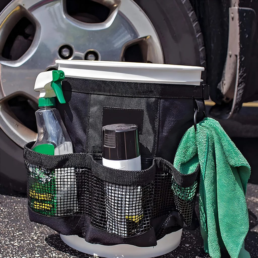 Black cylindrical polyester hanging storage bag fitted on a 5-gallon barrel.