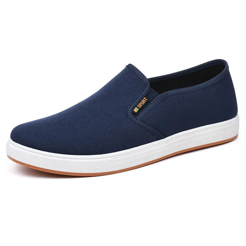 Men's low-top canvas trainers with slip-on design and round toe shape in black colour