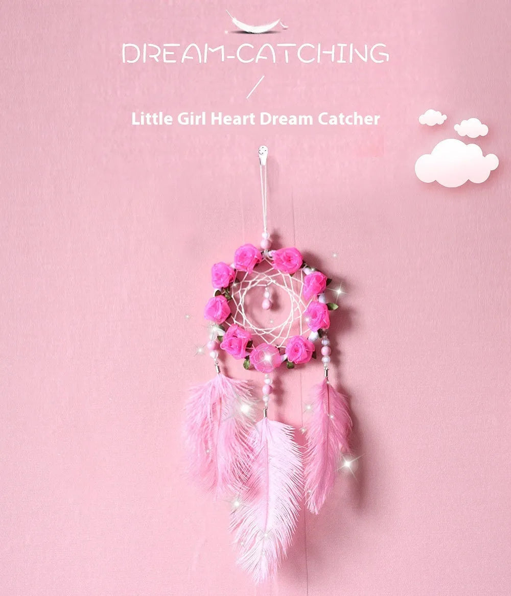 Pink ostrich feather dreamcatcher wind chime ornament measuring 10cm for wall decoration