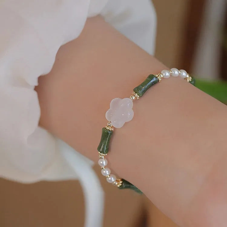 Traditional Chinese bamboo joint bracelet with Hetian jade and copper shell pearls