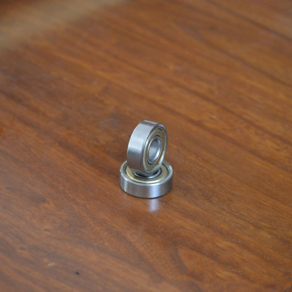 6000z carbon steel ball bearing showing 10mm inner diameter and 26mm outer diameter measurements