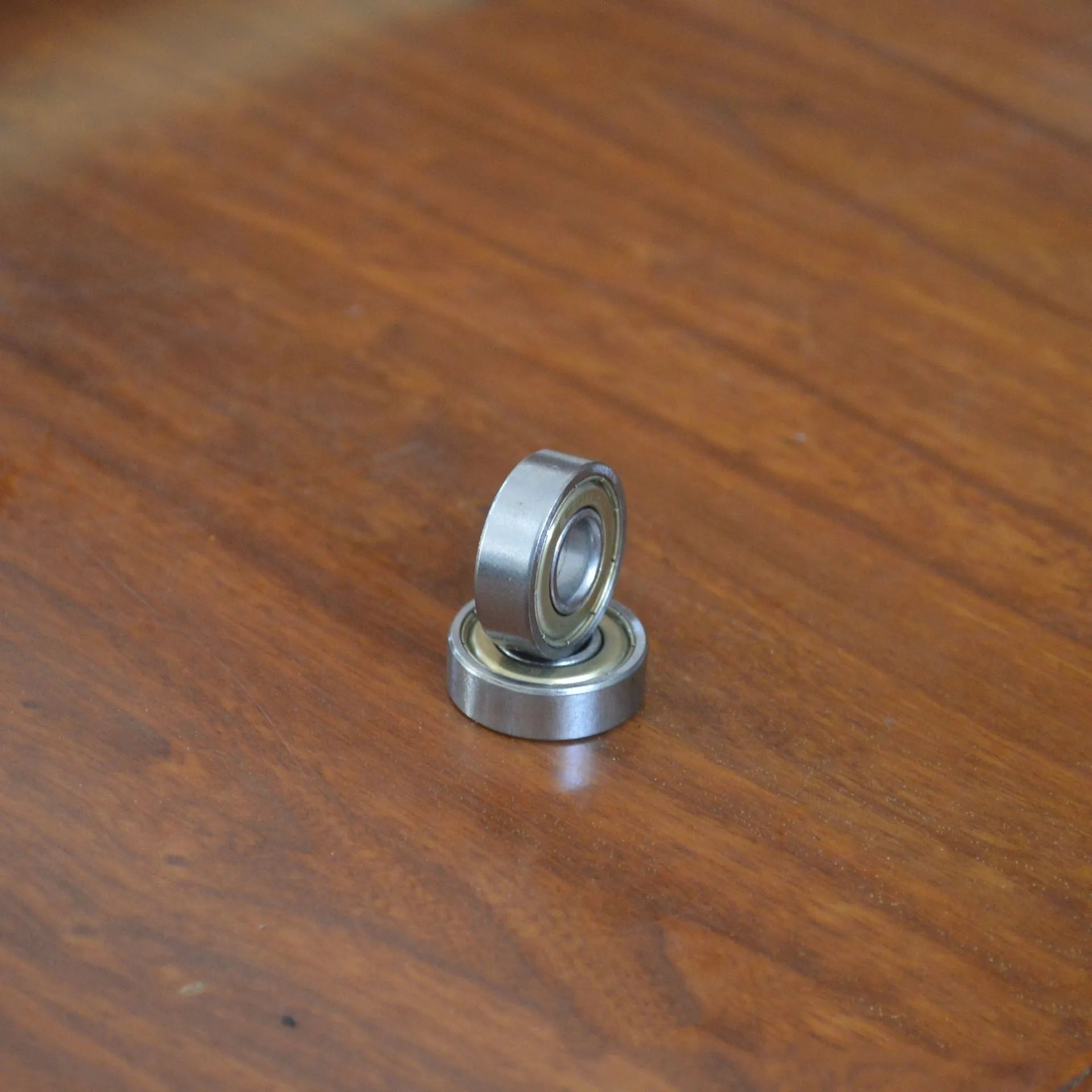 6000z carbon steel ball bearing showing 10mm inner diameter and 26mm outer diameter measurements