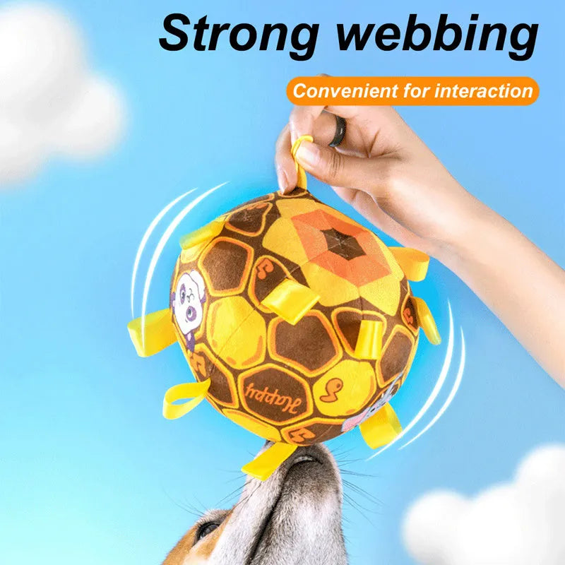 Green plush ball dog toy with a handle and internal bells, 15cm in diameter.