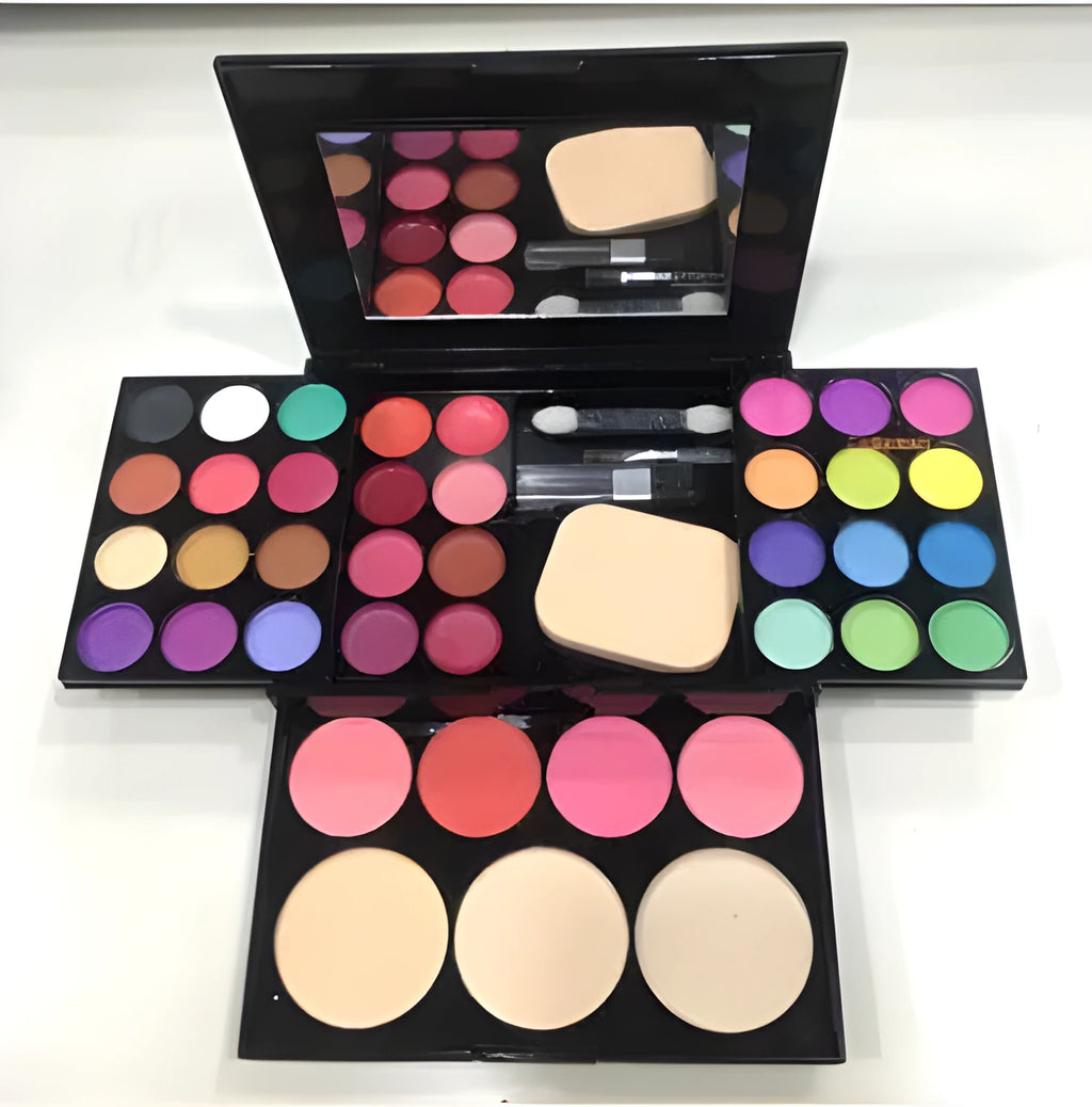 Three-layer makeup box set open showing 24 colour eyeshadow, 8 colour lipstick, 4 colour blush, powder cakes and mirror