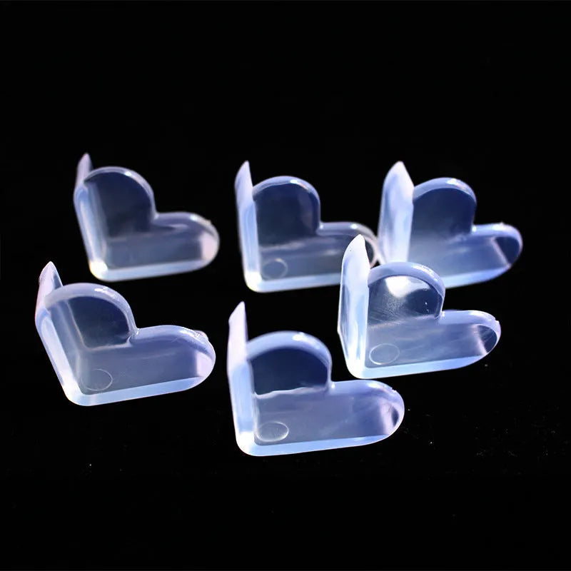 Heart-shaped PVC anti-collision baby safety corner protector on furniture edge, 5cm x 4cm x 2cm