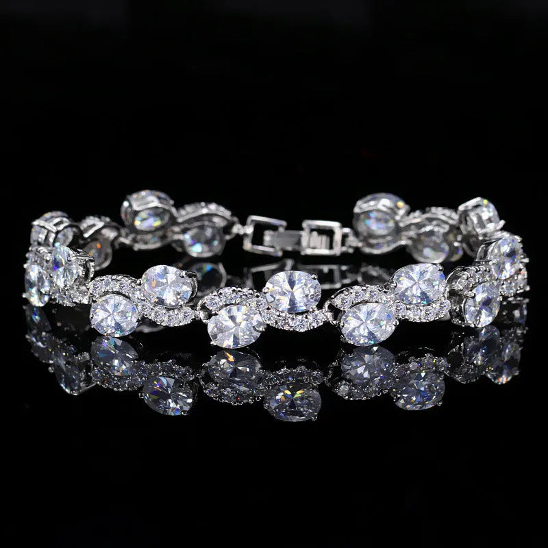Copper-plated gold bracelet with AAA zircon stones on a wrist, showing geometry design.