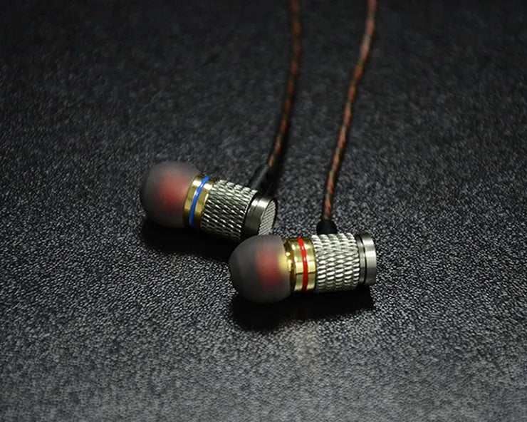 Black wired in-ear headphones with a 3.5mm L-bend plug shown alongside the version with an inline microphone.