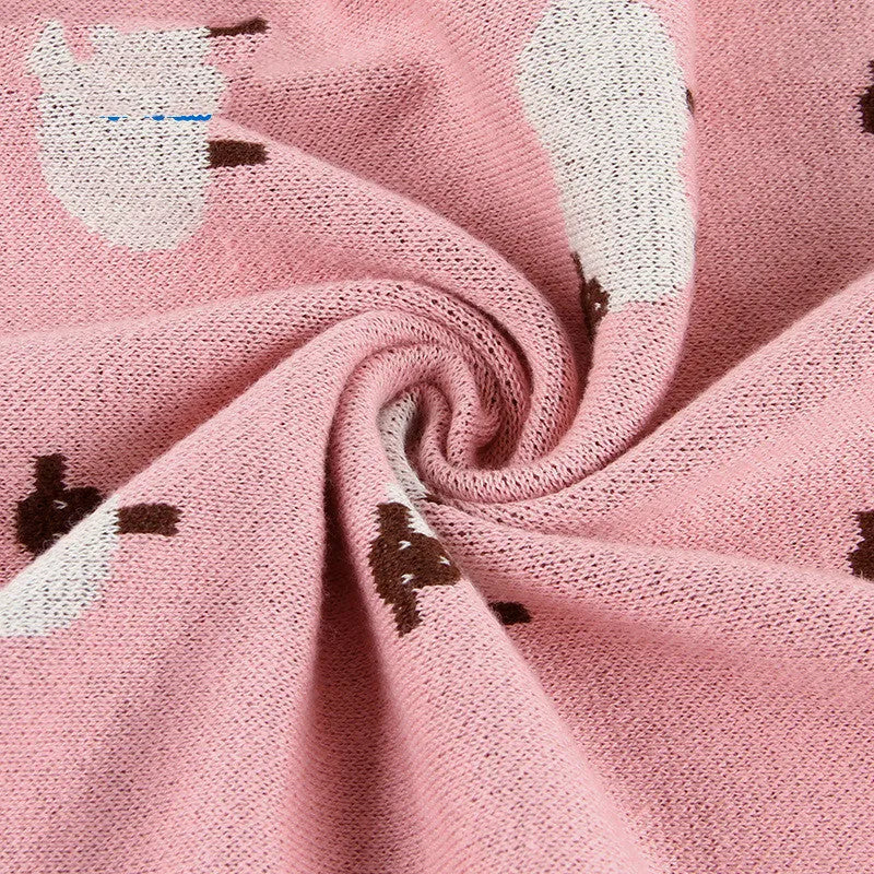 Pink and grey 100x80cm baby sheepskin blanket made from 100% cotton with a windproof cover.