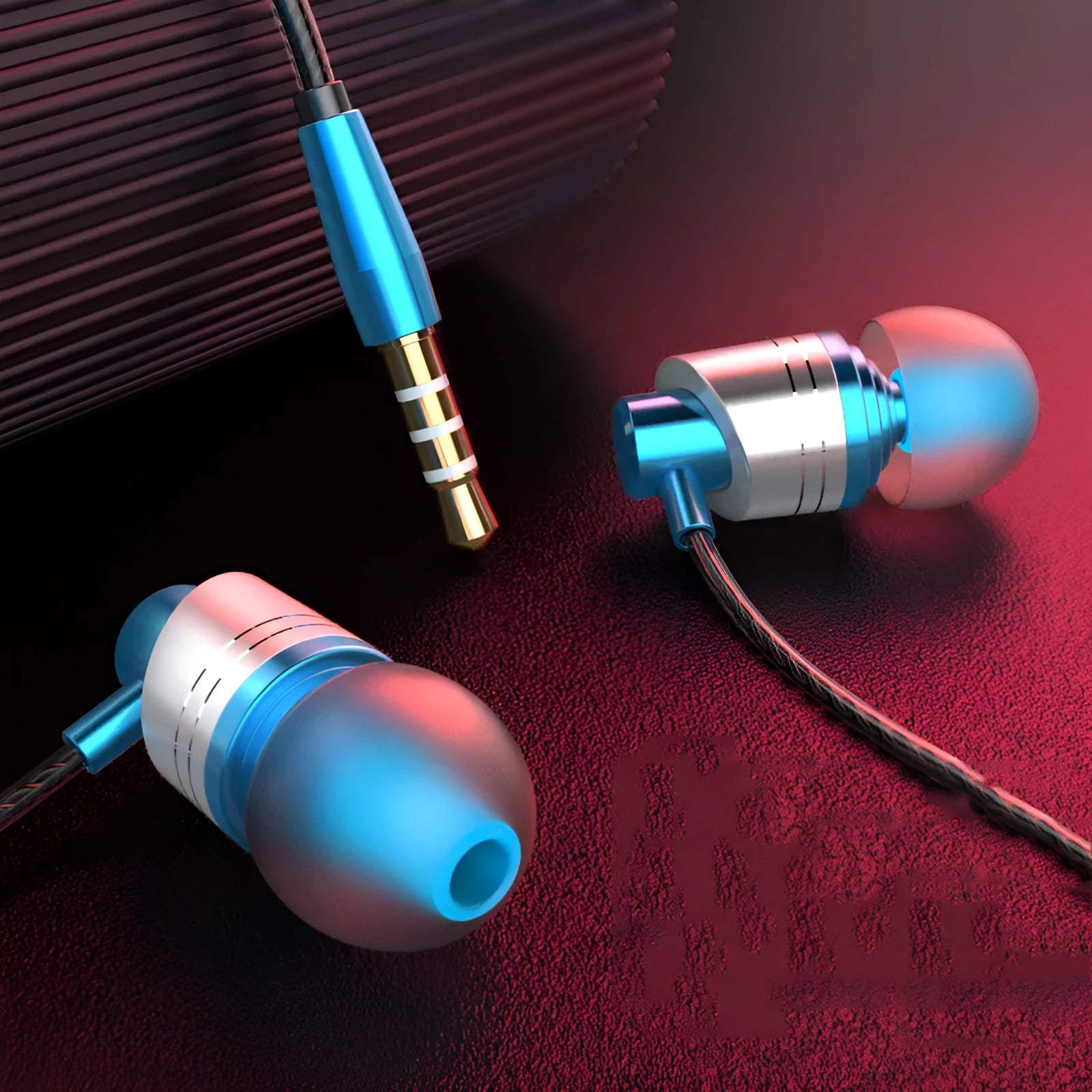 Black, blue, and red in-ear wired headphones with a 3.5mm plug and inline microphone on a TPE cable.