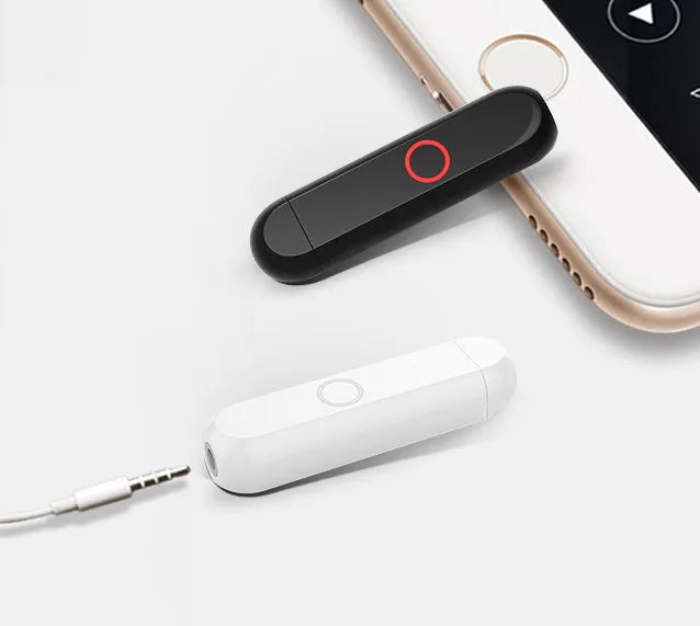 A1 Bluetooth audio receiver and converter unit with 3.5mm plug in black, blue, orange, or white.