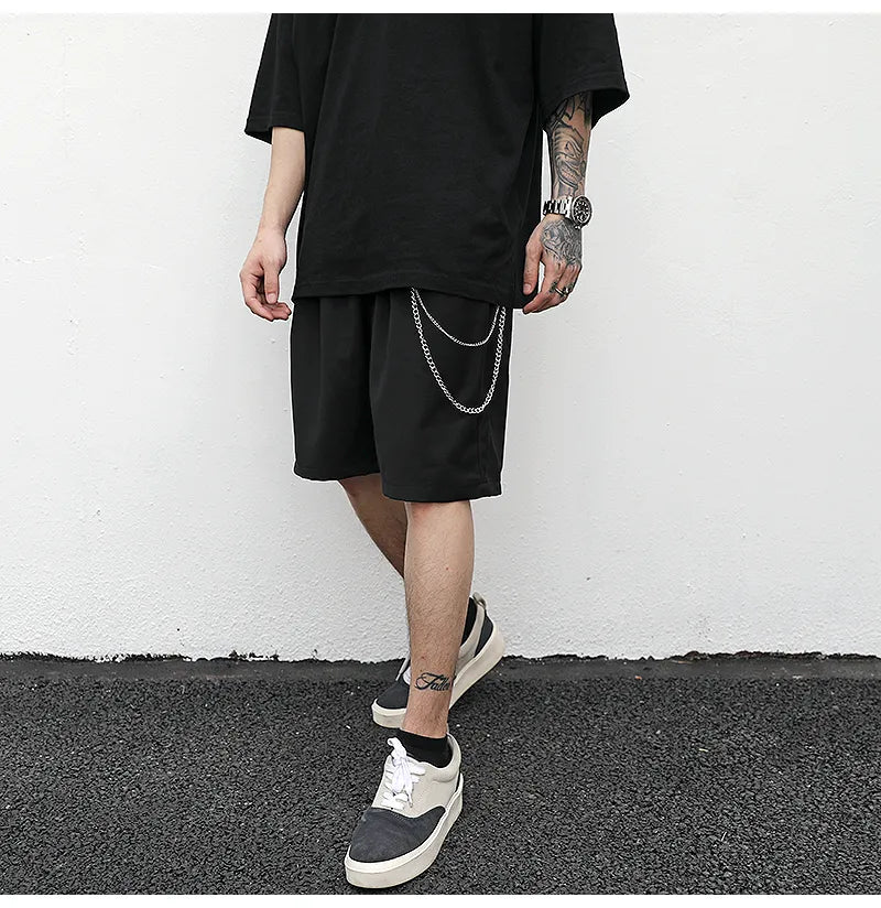 Black cotton trouser chain suit shorts for men with secure key chain, side view