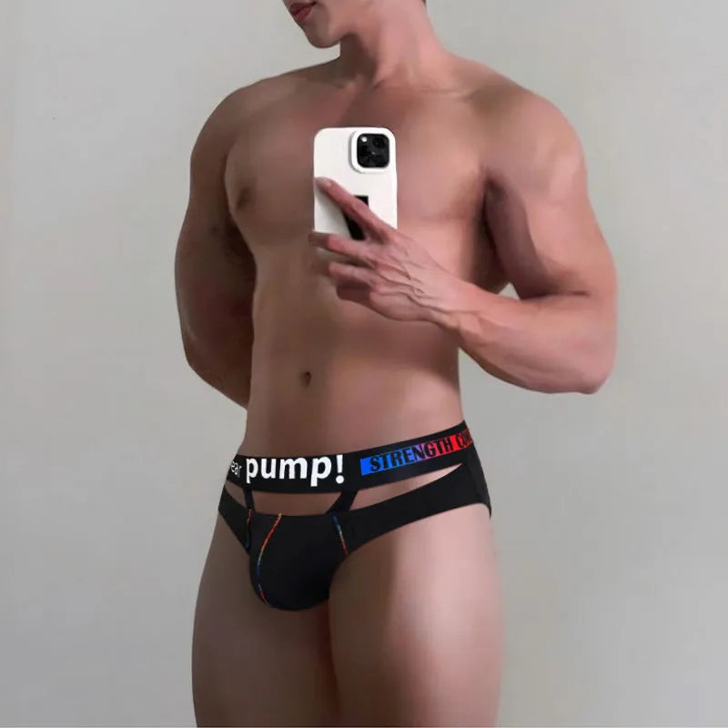 Men's solid colour modal low-waist briefs in black, laid flat.