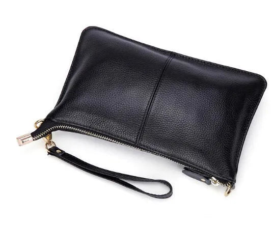 A cowhide lady slant bag in a chosen colour, showing hand and shoulder straps, with dimensions of 24 cm by 14 cm.
