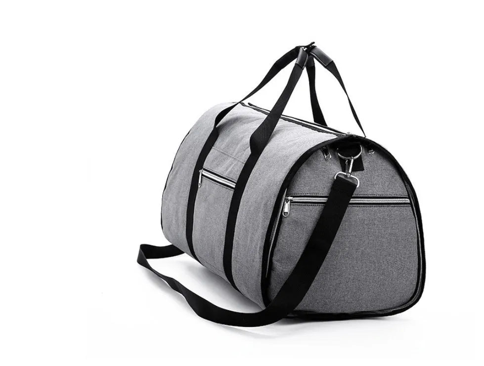 Medium-sized cylindrical travel bag in black Oxford cloth with a zipper and carrying handles.