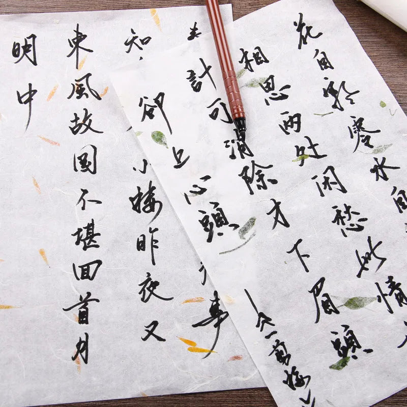 Ten sheets of Chinese-style painting paper in Green leaf design, each measuring 27.5 by 16.7 cm.