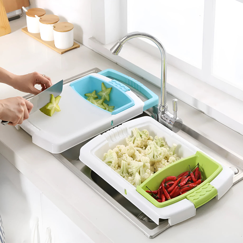 Green multi-function cutting board with drainage holes mounted on a kitchen sink