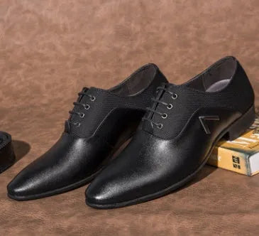 Men's black Oxford shoes with a low-cut PU upper and rubber sole for business casual wear.