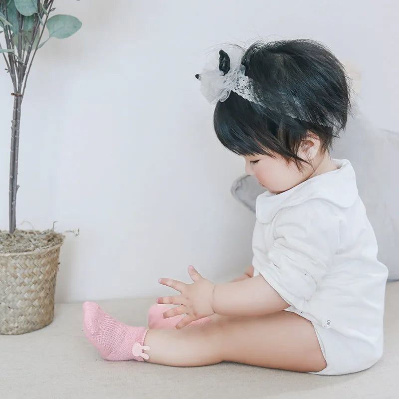 Baby mesh socks in pastel colours, cotton blend, XS to L sizes for 0-5 years, on a white background