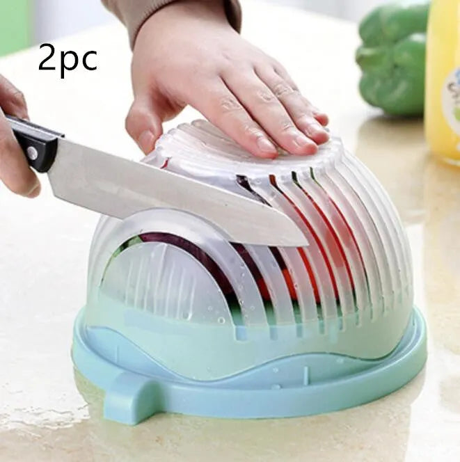 Blue salad cutter bowl with chopper lid and serving plate base for vegetable preparation