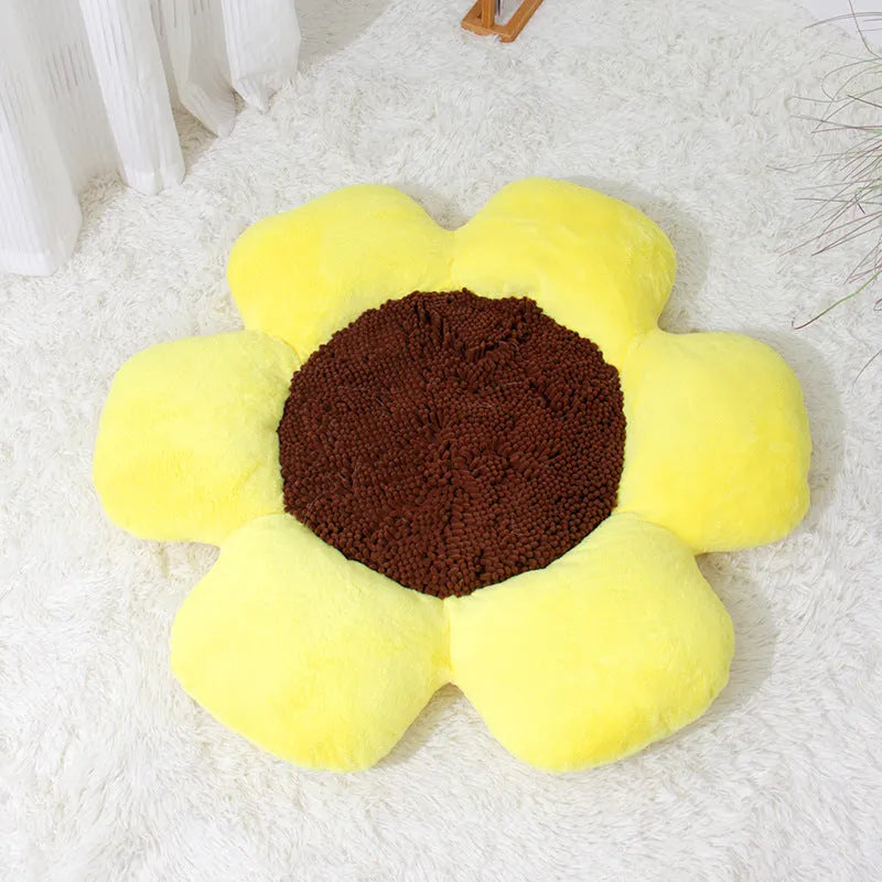 Round blue cat bed with high plush walls and soft filling, shown on a wooden floor.