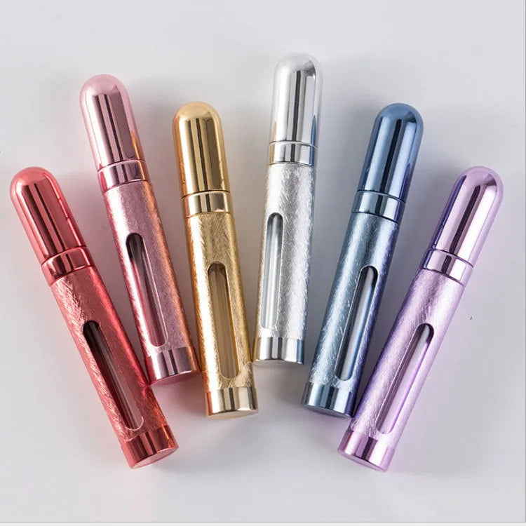 Blue aluminium travel perfume atomiser bullet bottle with glass liner, 12ml capacity.