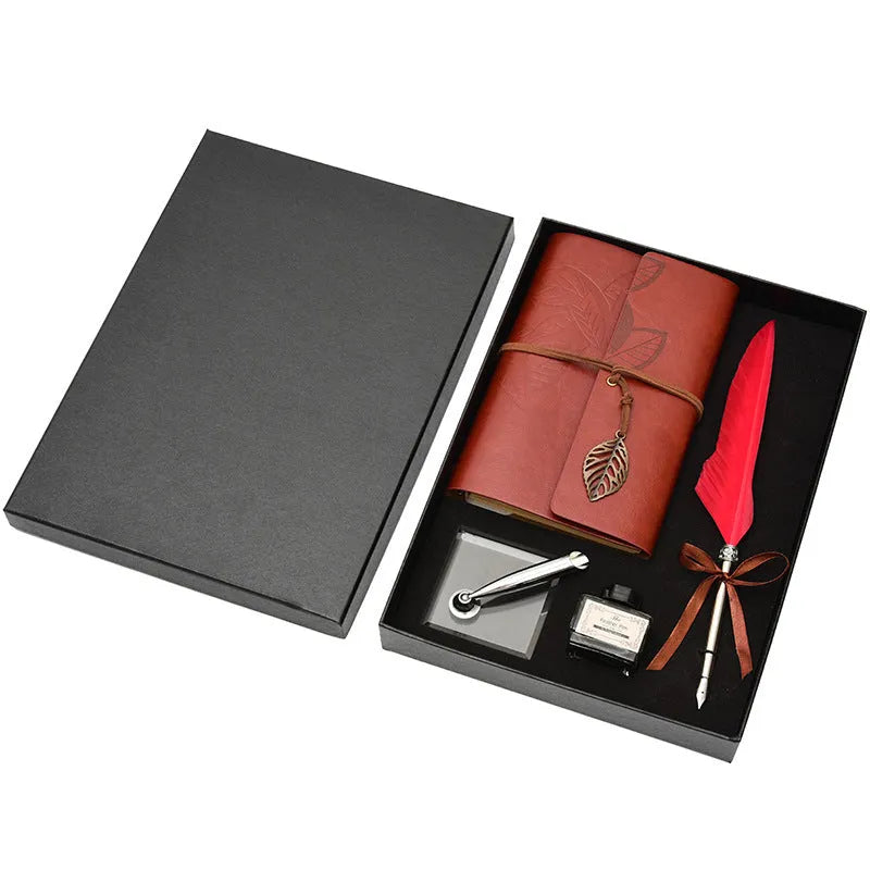 Feather dip pen gift set with copper pen, ink bottle, acrylic base, and antique book in box