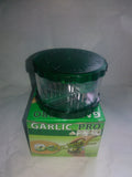 Green transparent garlic peeler kitchen gadget showing 8.5cm dimensions