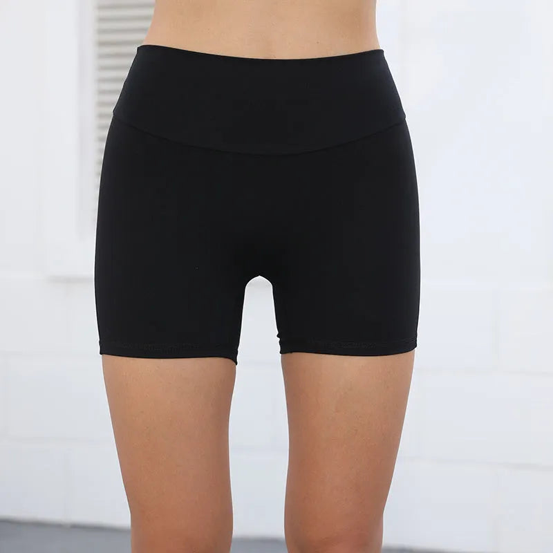 Women's high waist hip lifting shorts in electric blue colour with pockets for fitness activities
