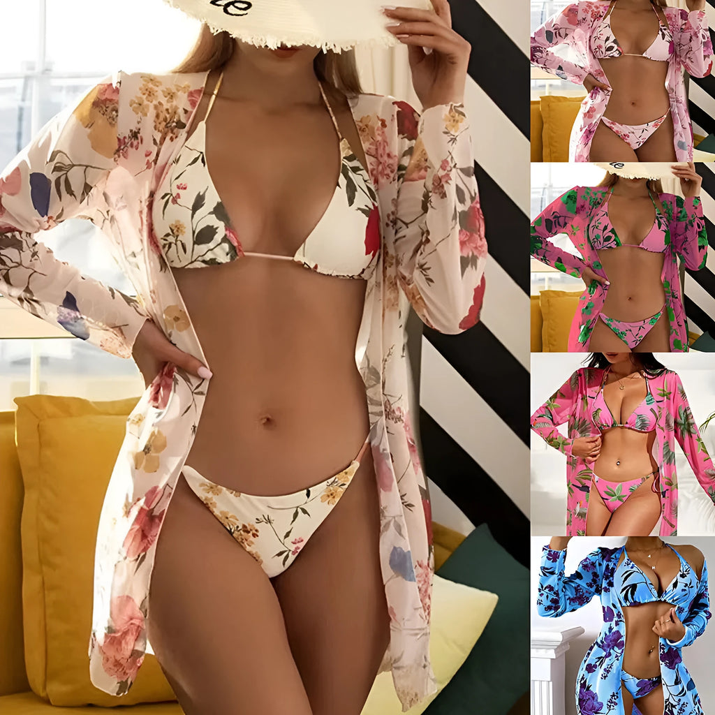 Women's floral print polyester bikini set with matching swim shorts and a sheer mesh cover-up blouse.