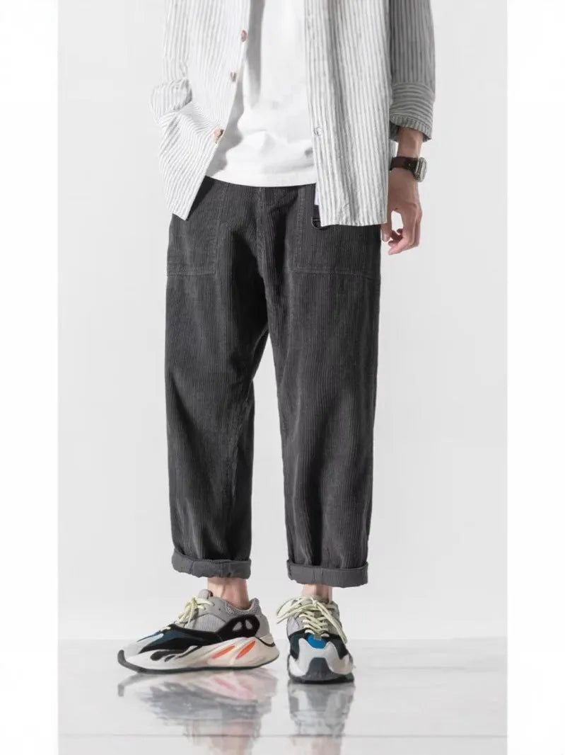Loose straight-leg pants with tapered wide-leg design in chemical fibre blend fabric