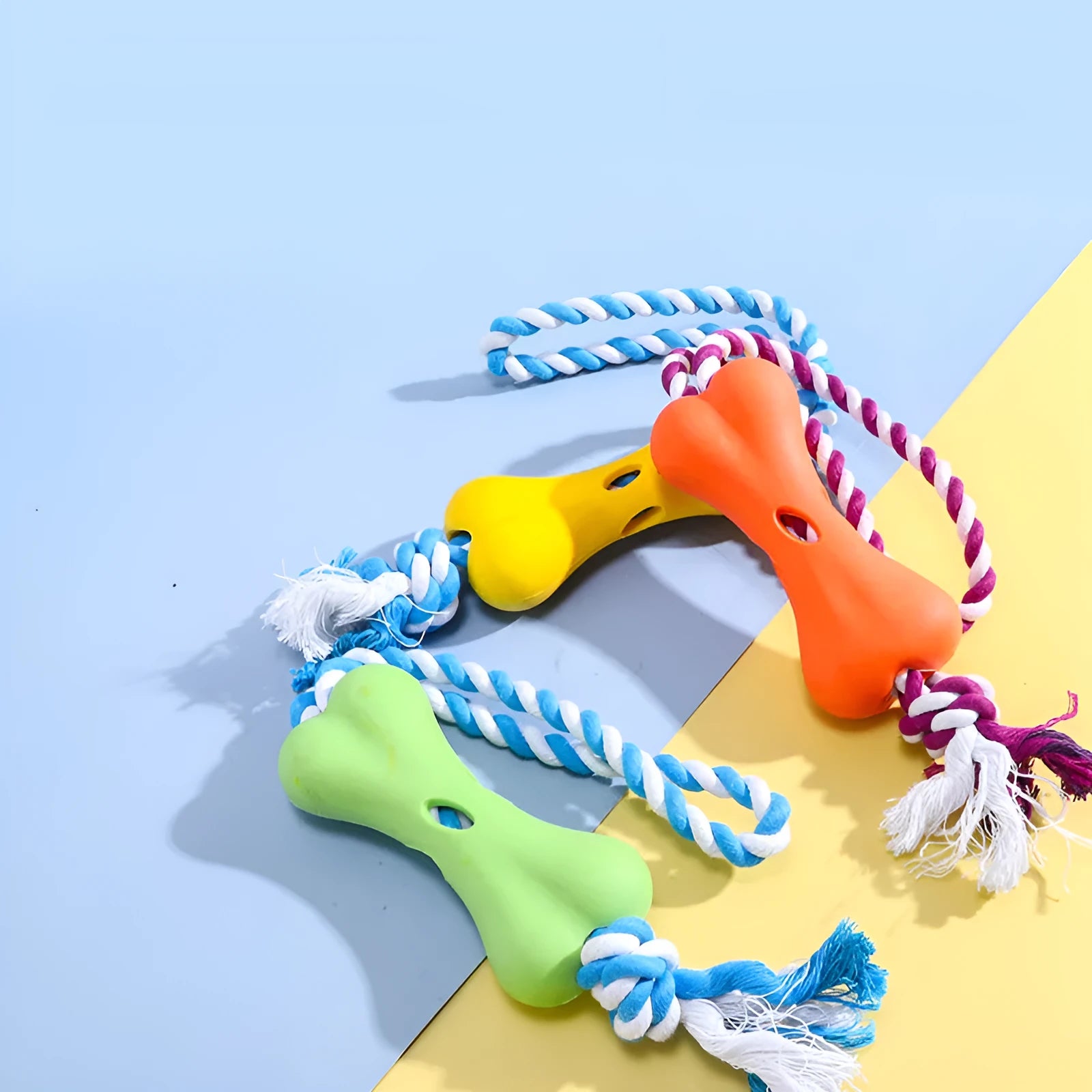 Green porous bone and rope knot dog chew toy for treat stuffing and gnawing teeth relief