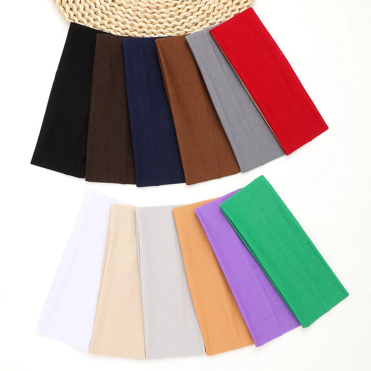 Wide solid colour sports headband with high elasticity and sweat-absorbing fabric, available in 12 colours