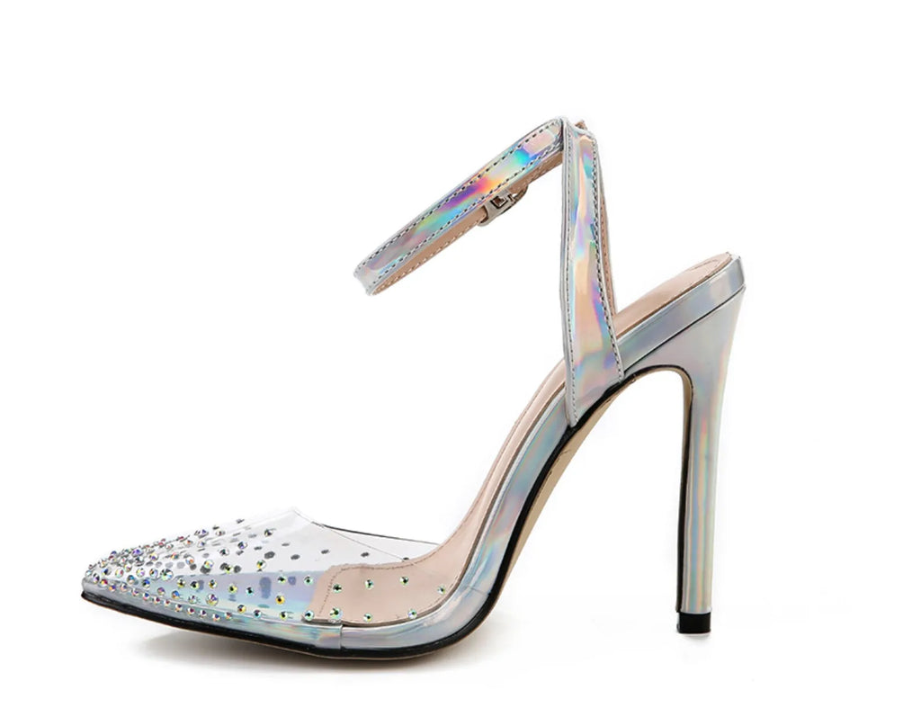 Clear PVC women's sandals with a pointed toe and a thin 10cm stiletto heel on a plain background.