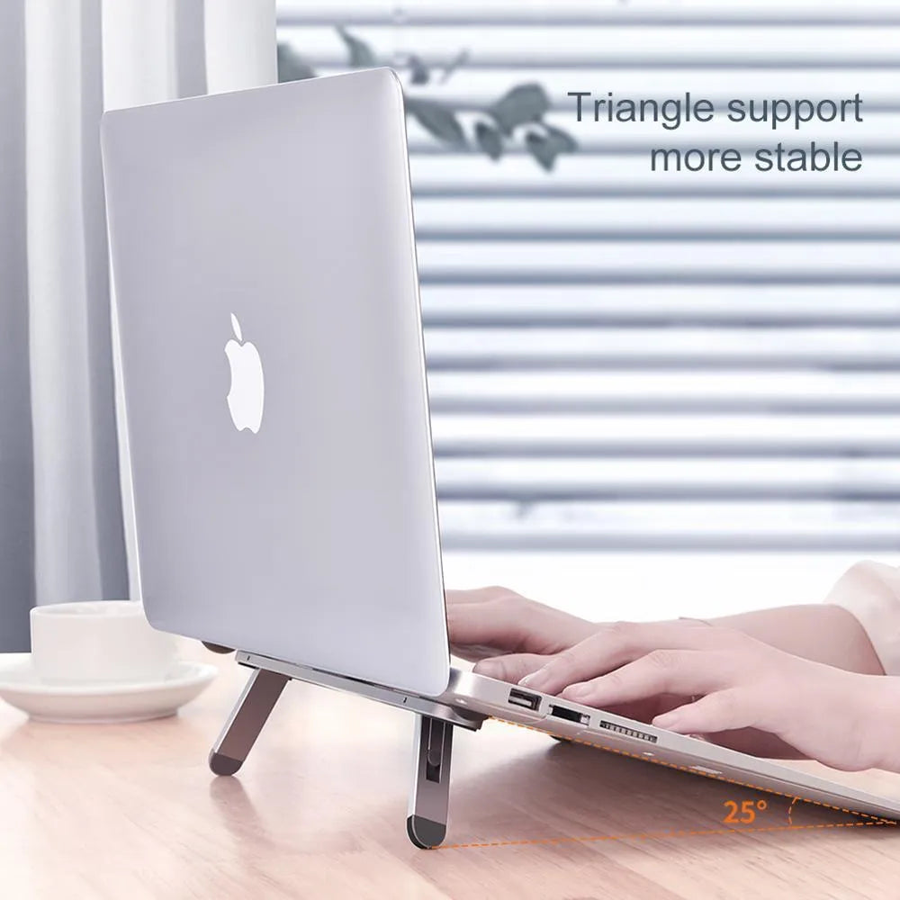 Silver aluminium alloy notebook stand 216x26mm with silicone pads on desk