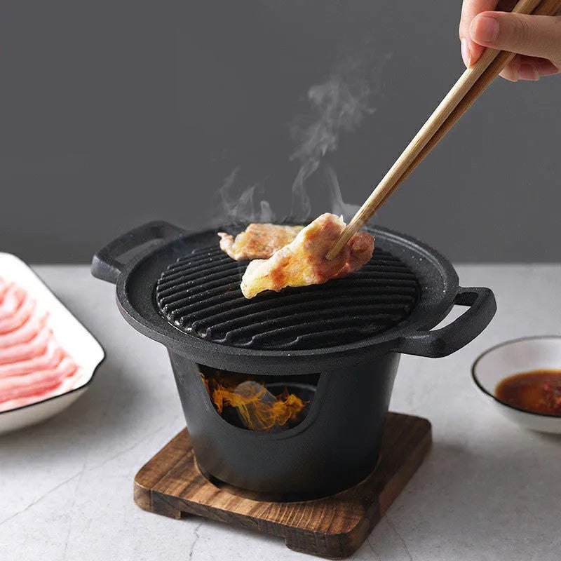 Mini BBQ grill alcohol stove double heads black 18x18x2cm on table with anti-stick plate