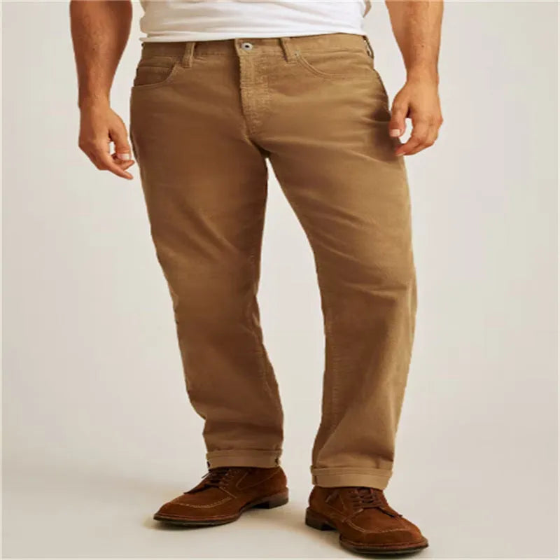 Straight-leg corduroy trousers in a loose casual fit on a mid-waist, shown in army green colour.