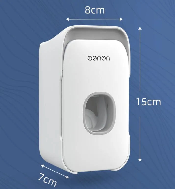 Automatic toothpaste dispenser in blue colour mounted on a bathroom wall