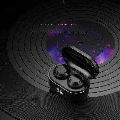 Black in-ear stereo Bluetooth wireless headset with silicone ear tips displayed on a dark background.