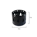 Black iron Christmas candlestick with deer and elk bracket design on a table.